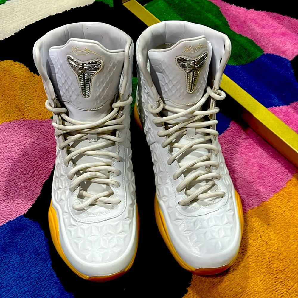 Gently used Kobe Bryant shoes for men high top all white with custom yellow
